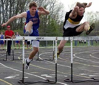 Patriot track teams top Starfires (04/30/03)
