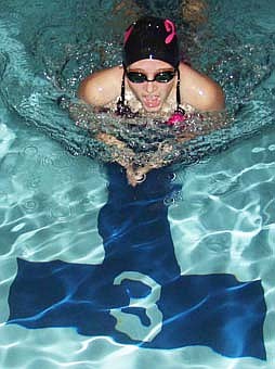 Jay County swimmers nearly perfect in 1st two (11/21/03)