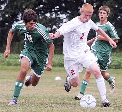 Jay Co. falls to Trojans