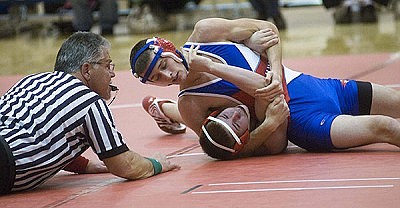 JC grapplers top Rebels