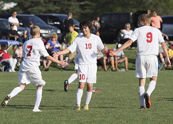 Breaking: Jay boys get first win
