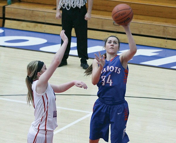 Late free throws lift girls over Raiders