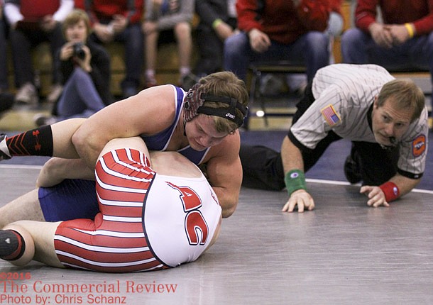 Three wrestlers earn titles