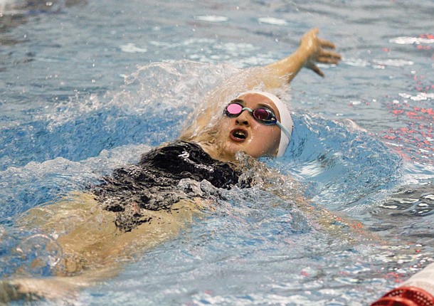 Patriot swim teams split first home meet