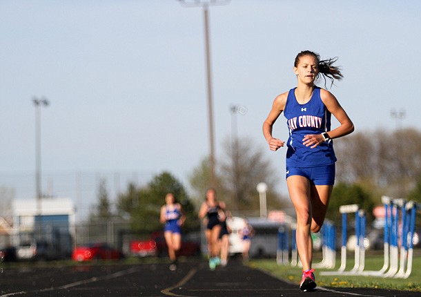Jay girls coast past Heritage, boys fall