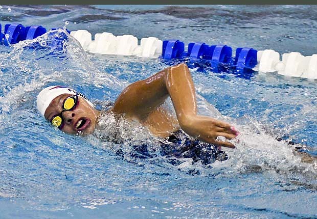 JC swimmers defeat pair