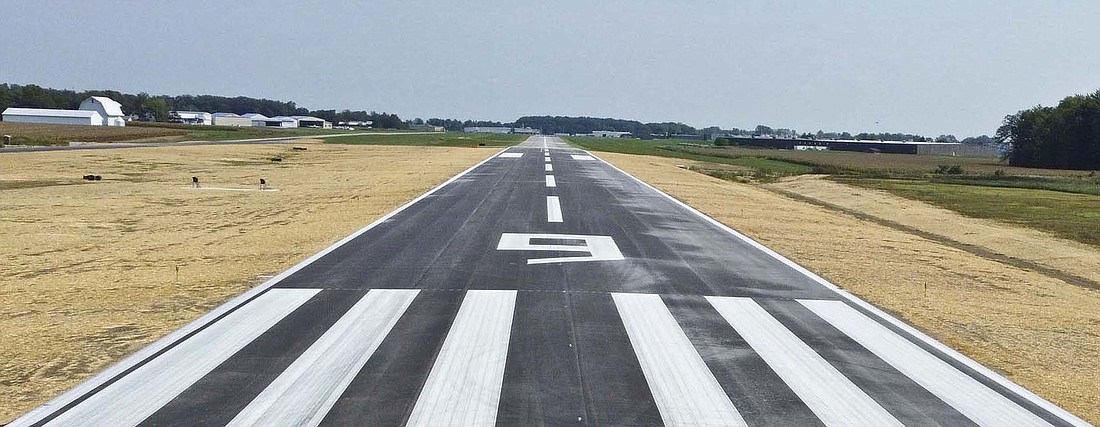 This overhead view shows the completed Portland Municipal Airport runway extension that was completed in fall 2022. It will be honored next month by the Great Lakes Chapter of the American Association of Airport ExecutivesÕ as the General Aviation Project of the Year. (Butler, Fairman & Seufert)