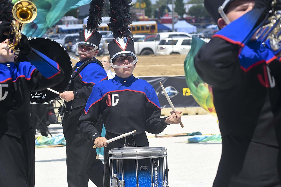 Gabe Pinkerton of Jay County High School plays the snare drum during the Marching Patriots’ preliminary performance Friday at the Indiana State Fair. JCHS earned the Class 3A caption award for percussion for the third time in the last four state fair competitions. (The Commercial Review/Andrew Balko)