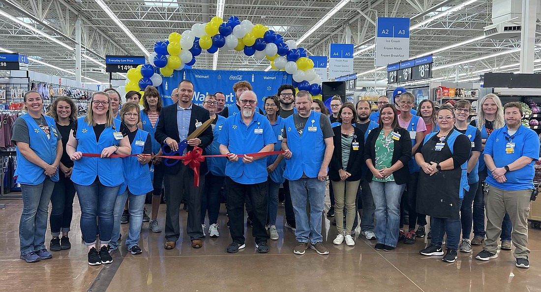 Walmart held a ribbon-cutting ceremony Friday for its renovated Portland store. Changes to the facility include new registers with additional self-checkout lanes, a reorganized grocery department, renovated restrooms and updates to flooring, paint, signs and the parking lot. (Photo provided)