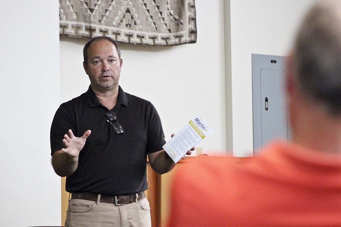 Marlin Stutzman, a candidate for the 2024 Republican nomination in Indiana’s 3rd District, answers a question from Rex Journay on Monday at John Jay Center for Learning. Stutzman shared his platform and fielded questions from Jay County Republicans. (The Commercial Review/Bailey Cline)