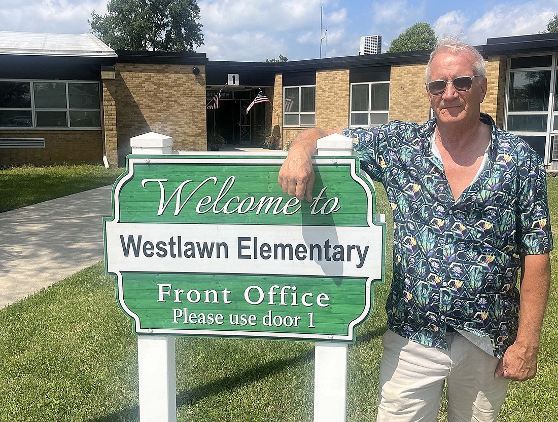 Steve Schwieterman poses outside of the former Westlawn Elementary School building early this month. He wasn’t quite sure what he would do with the facility when he bought it from Jay School Corporation in August 2022, but now has three businesses as tenants and is expecting more to follow. (The Commercial Review/Ray Cooney)