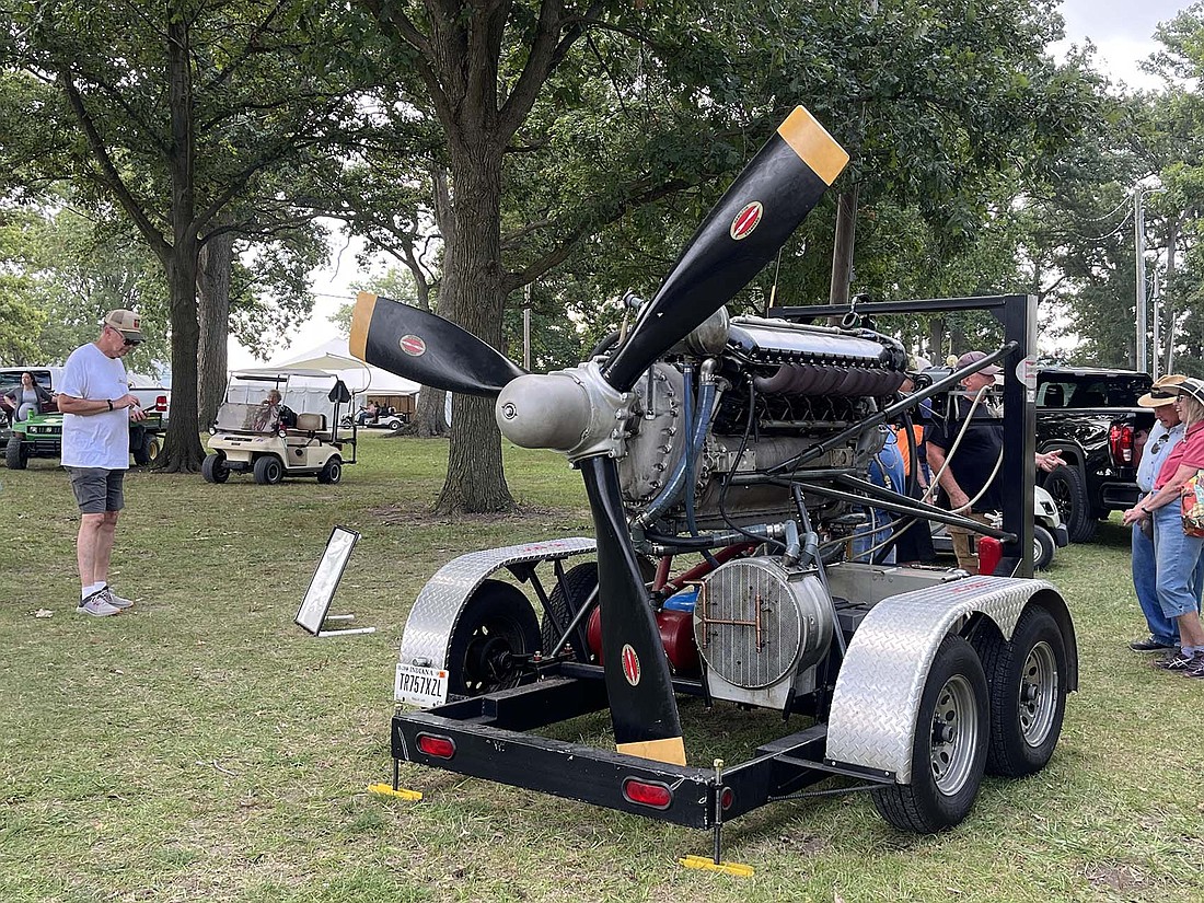 An Allison V-1710 engine displayed by Ted Pinkerton of Bippus at the Tri-State Gas Engine and Tractor Show was drawing a steady stream of visitors Friday morning at Jay County Fairgrounds. Most were stopping to ask Pinkerton a version of the same question: “When’s the next time you’re gonna run this?” (The Commercial Review/Ray Cooney)