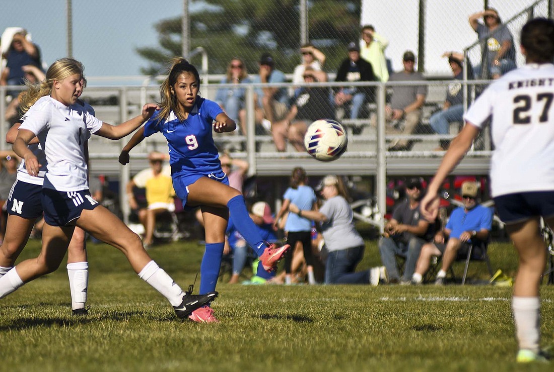 Jay County High School sophomore Aixa Lopez fires a shot from the left side of the box for the Patriots' only goal of Thursday's 1-1 tie with Norwell. Her shot went just inside the right post for her third goal in the last two games. (The Commercial Review/Ray Cooney)