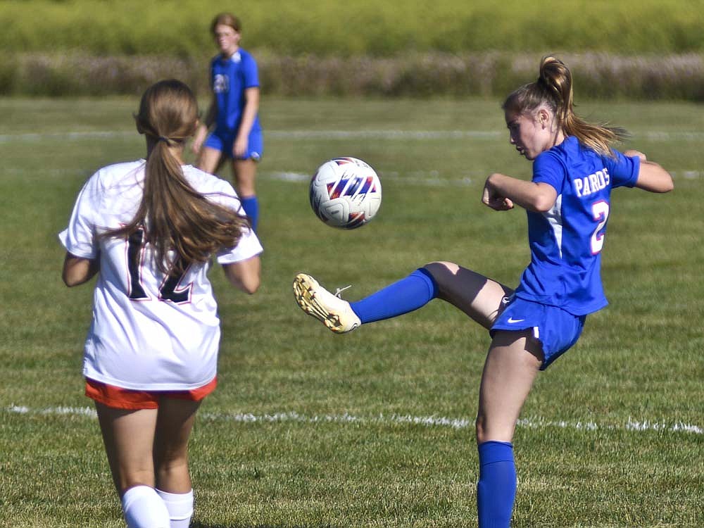 Jay County High School exchange student Naroa Zugasti Goicoechea keeps the ball in the Patriots' offensive end during the first half of Saturday's 4-1 loss to the visiting Coldwater Cavaliers.  JCHS is now 1-4-1 heading into Tuesday's game at Wapahani. (The Commercial Review/Ray Cooney)