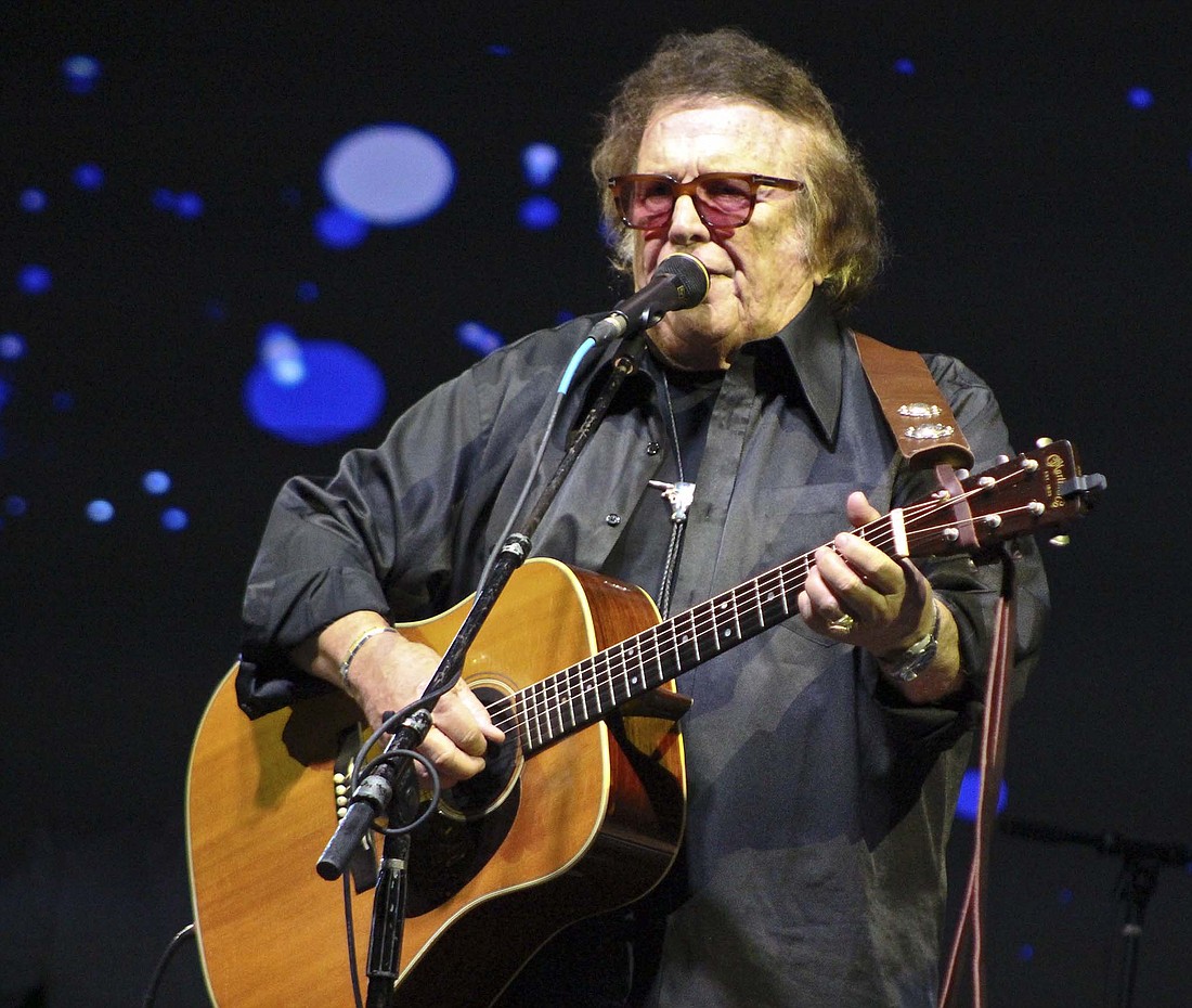 Award-winning musician Don McLean performed Saturday during a free show at the new Brown Family Amphitheater on Ball State University campus. Pictured above, McLean sings “Crossroads,” a piece from his hit 1971 album, “American Pie.” McLean took the stage about an hour and a half after Blackford native Jerry Barker and Muncie musicians Mike Martin and The Peaceful Revolution. (The Commercial Review/Bailey Cline)