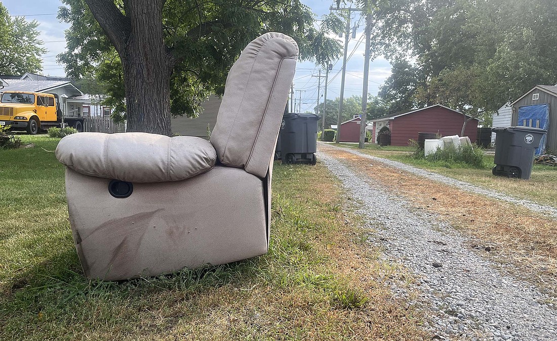 A couch sits along an alley on the west side of Portland on Wednesday morning. In the background right are several mattresses, and another couch was sitting along the alley to the west. Portland City Council again on Tuesday discussed the issue of large items being disposed of along streets and alleys. The city offers free drop off of such items at the street department once a quarter. Residents can also purchase a permit at city hall to have such items picked up. (The Commercial Review/Ray Cooney)