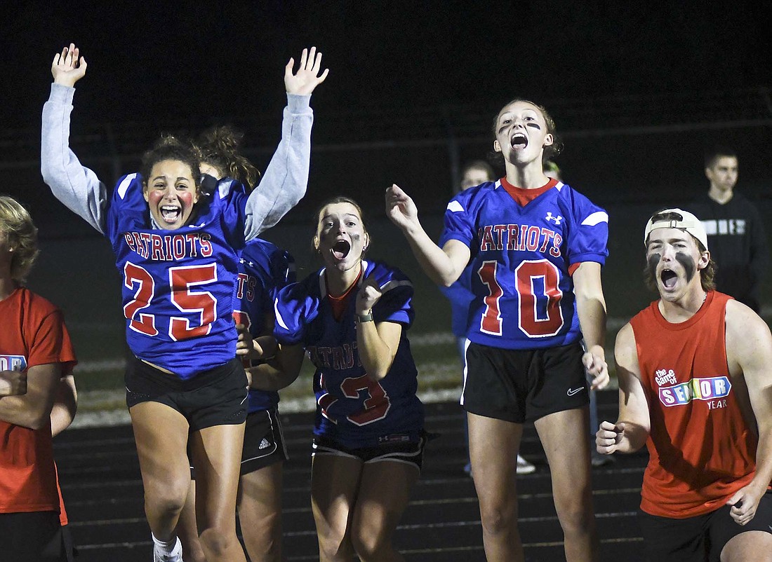 Jay County High School held its spirit night festivities Wednesday as part of homecoming week. Pictured above, from left, seniors Laila Waddell, Brenna Haines, Bella Denton and Sam Myers celebrated their team’s victory in the championship volleyball game. (The Commercial Review/Ray Cooney)