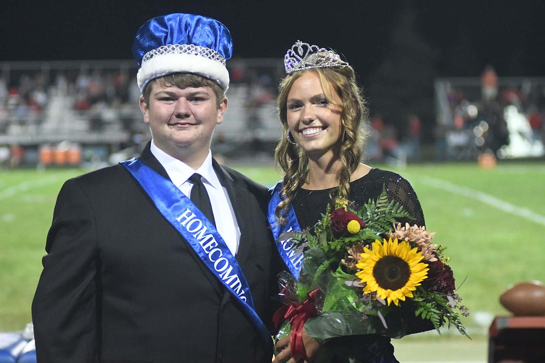 Jay County High School crowned its homecoming king and queen Friday during halftime of the Patriot football team’s 19-7 loss to Class 2A No. 2 Bluffton. Pictured are king Reece Leavell and queen Molly Muhlenkamp. (The Commercial Review/Ray Cooney)