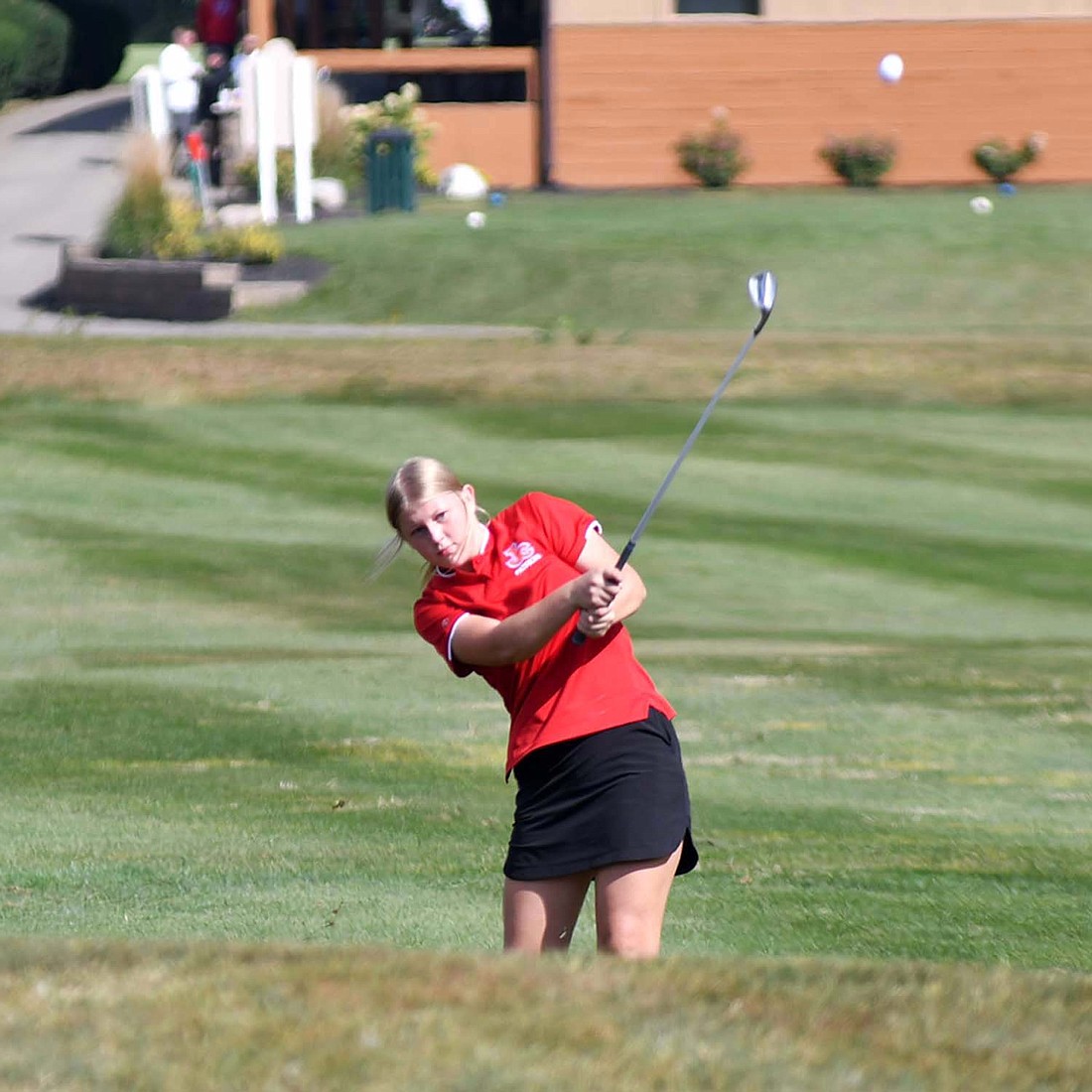 JCHS freshman Brooklynn Bright follows through on her swing on hole No. 1 at Crestview Golf Club during the IHSAA girls golf sectional No. 17 on Saturday. Bright had a career day, shooting a 102 that featrued a pair of pars and seven bogeys. (The Commercial Review/Andrew Balko)