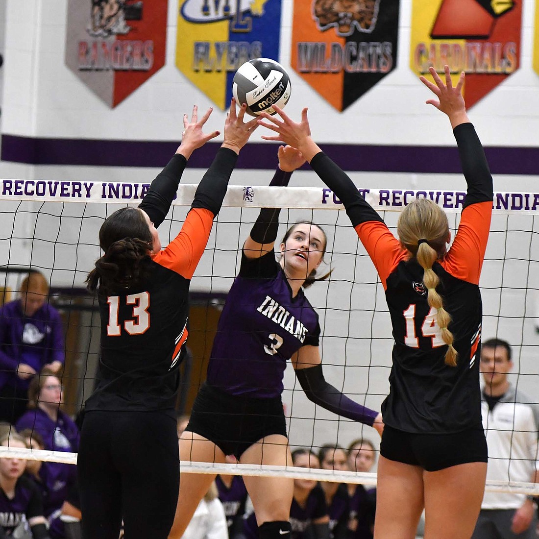 FRHS senior Saige Leuthold (3) follows through on a hit that brushes off the finders of Coldwater's Spencer Etzler (13) during the Indians' 25-17, 25-18, 25-20 loss on Tuesday. The attack resulted in Leuthold's only kill. She also had a block and a dig. (The Commercial Review/Andrew Balko)