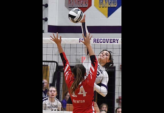 FRHS senior Paige Guggenbiller goes up for a hit during the first set of Fort Recovery's 25-17, 25-9, 25-13 win over Newton on Monday. Guggenbiller totalled five kills with two in the first set and three in the third. (The Commercial Review/Andrew Balko)