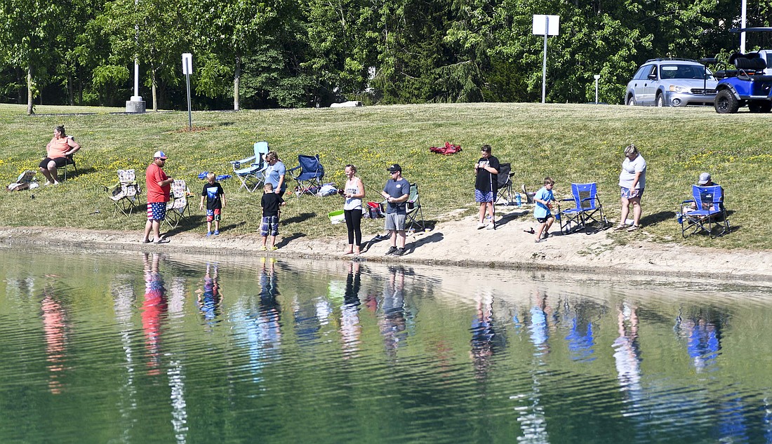 Fishing is allowed in the pond at Portland’s Hudson Family Park, such as the Portland Optimist Club fishing derby (pictured) that was held in June. But Portland Park Board is asking Portland City Council to pass an ordinance establishing catch-and-release fishing only after parks employees recently noticed that some who fish at the park have been using nets and leaving with 20 to 30 fish at a time. (The Commercial Review/Ray Cooney)