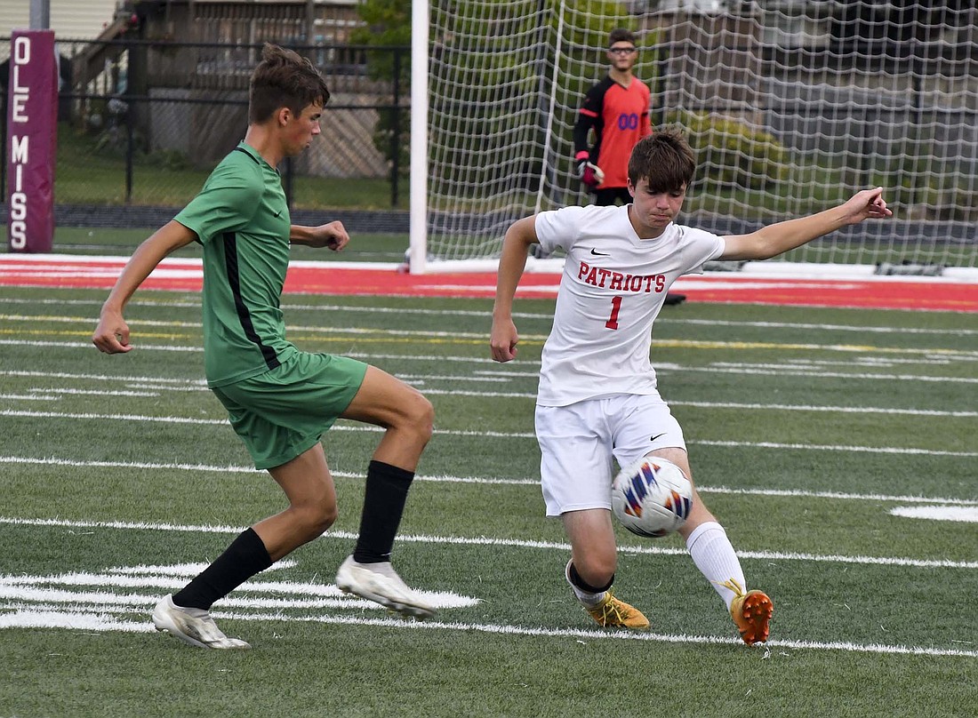 JCHS junior defender Gavin Young (1) boots away the ball during Jay County's 3-1 win over Yorktown in the IHSAA Class 2A Sectional 24 semifinal on Wednesday. Young was a part of a backline that only allowed the Trojans to take four shots in the match. (The Commercial Review/Andrew Balko)