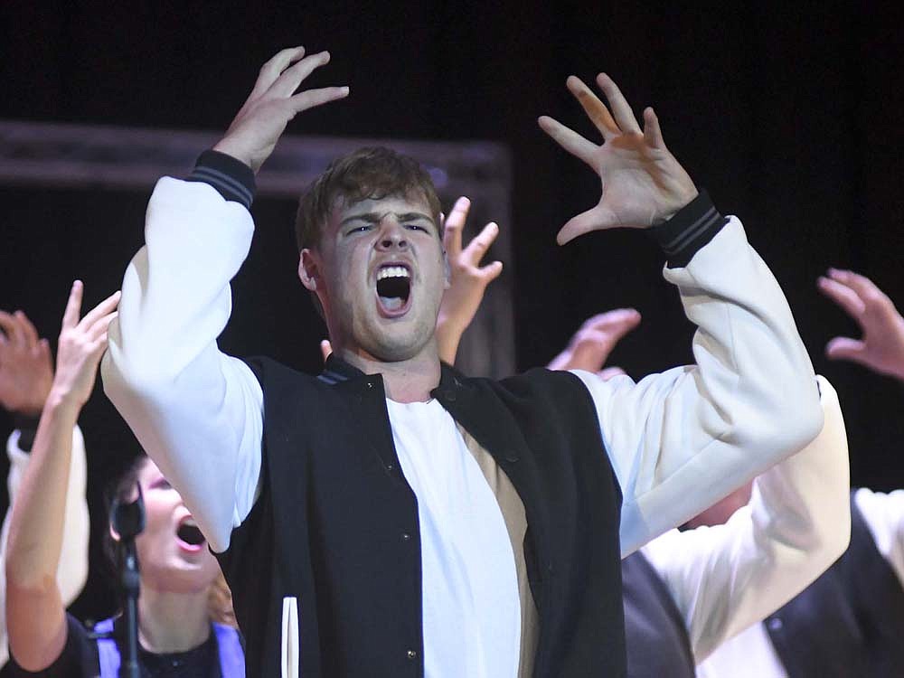 Ben Heath performs Sunday afternoon as part of Patriot Edition during the Jay County Junior/Senior High School fall choir concert. Patriot Edition previewed its 2024 competition show, which includes “Runaway” by Jefferson Starship and “Turn the Page” by Bob Seeger. (The Commercial Review/Ray Cooney)