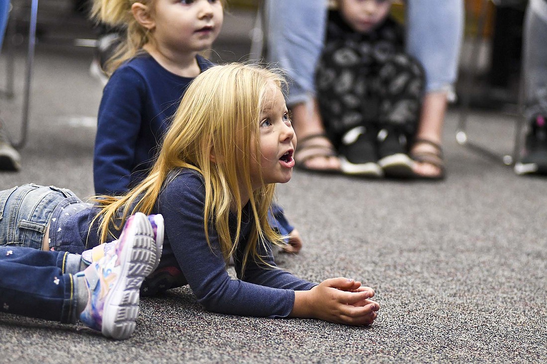 Four-year-old Perci Hartman responds to a question during family story time Tuesday morning at Jay County Public Library in Portland. The next family story time at the library is scheduled for 10 a.m. Oct. 24. (The Commercial Review/Ray Cooney)