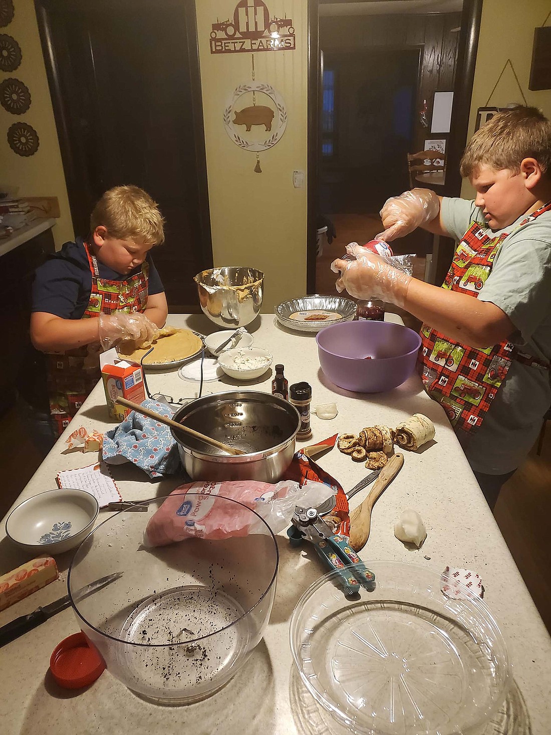 Brothers Bennett and Emmett Betz started baking pies in June in honor of their father Andrew Betz, who died in a tractor accident seven years ago. 2 Guys Pies has sold more than 100 pies so far with the help of their mom Jenn. (Photo provided)