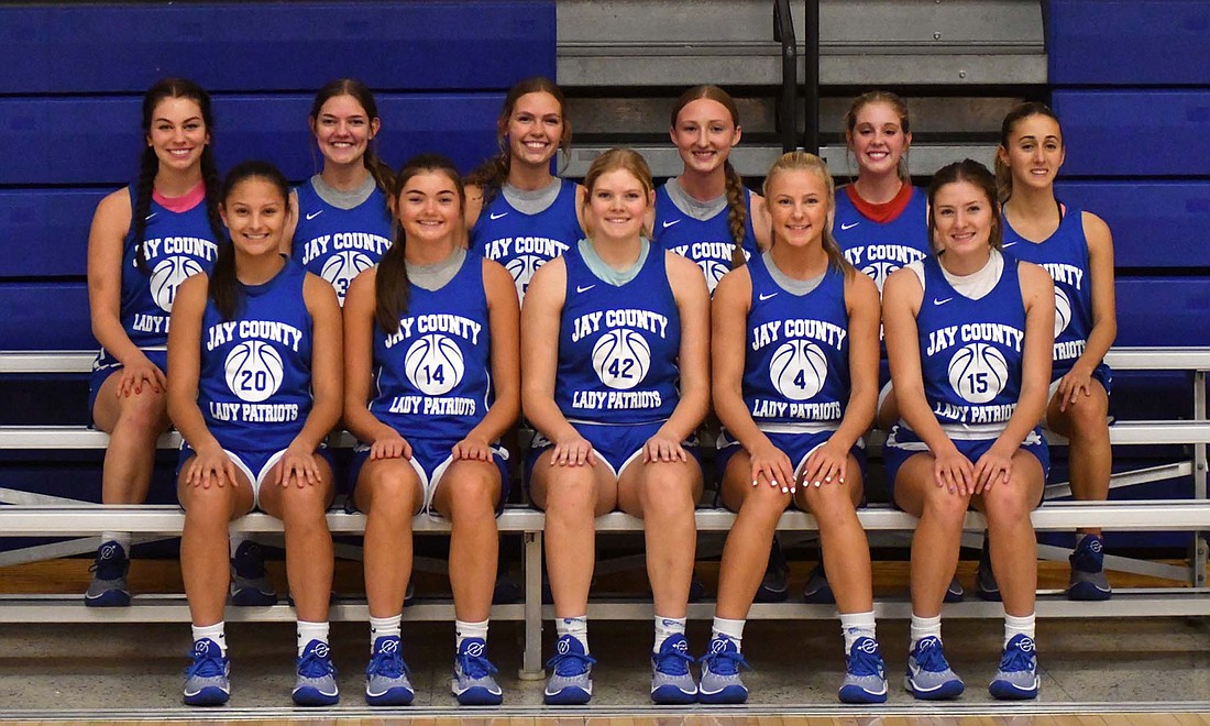 Pictured is the 2023-24 Jay County High School girls basketball team. Pictured, front row from left, are Raylah Newton, Meredith Dirksen, Cassie Petro, Hallie Schweiterman and Alexis Sibray. Back row are Sophie Saxman, Breanna Dirksen, Mollie Muhlenkamp, Bella Denton, Danielle May and Livia Luzzi. Not pictured is Natalie Carreno. The Patriots are ranked ninth in the AP Class 3A preseason poll. (The Commercial Review/Andrew Balko)