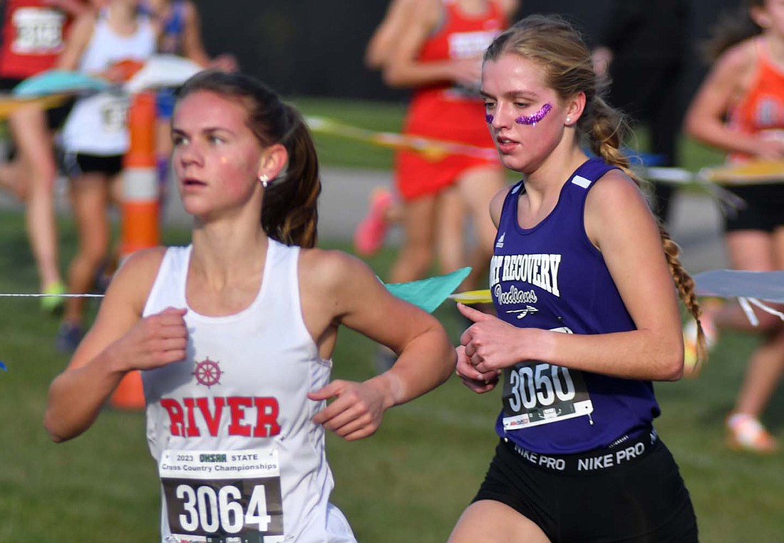 Natalie Brunswick of Fort Recovery High School approaches the one-mile mark during the OHSAA cross country state championship on Saturday. Brunswick paced the Indians with a 19 minute, 41.65 seconds finish for 43rd place, which was five seconds off of her time in 2022. (The Commercial Review/Andrew Balko)