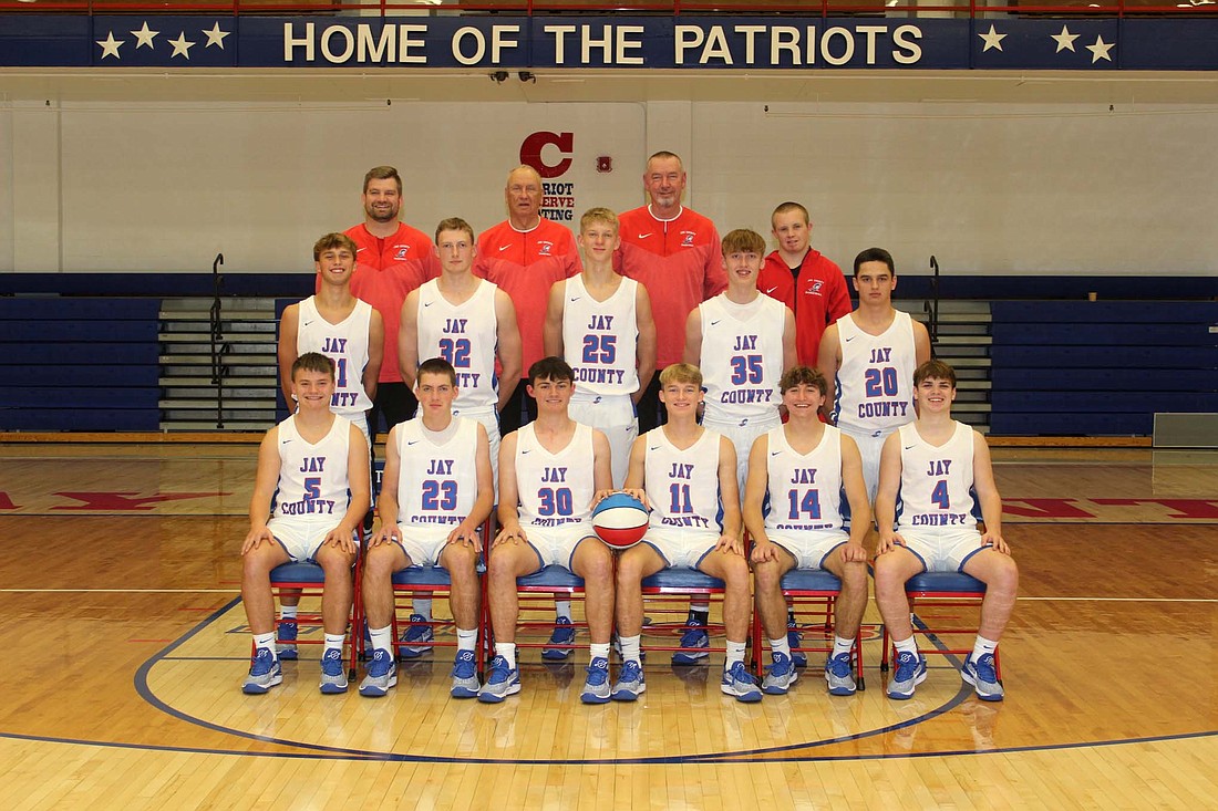 Pictured is the 2023-24 Jay County High school boys basketball team. Front row from left are Levi Muhlenkamp, Eli Dirksen, Aiden Phillips, Jackson Edwards, Carter Fugiett and Parker Nichols. Middle row are Trevin Dunington, Wesley Bihn, Cole Forthofer, Gradin Swoveland and Liam Garringer. Back row are assistant coach Aaron Daniels, coach Jerry Bomholt, assistant coach Doug Arbuckle and manager Luke Vormohr. Not pictured are Ben Crouch, manager Caden Gambill and assistant coach Jared Kahlig. (The Commercial Review/Andrew Balko)