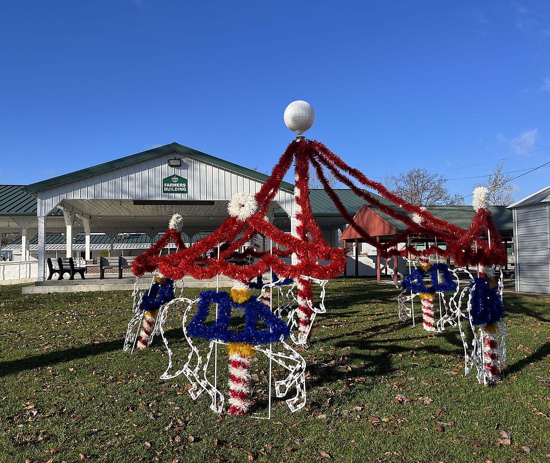 Cruis’n the HoliJay Lights at the Fairgrounds continues tonight and Saturday at Jay County Fairgrounds. The drive-thru holiday light display will be open every Friday and Saturday through Christmas as well as Thursday, Dec. 21. There is no admission fee, but free-will donations are accepted. (The Commercial Review/Ray Cooney)