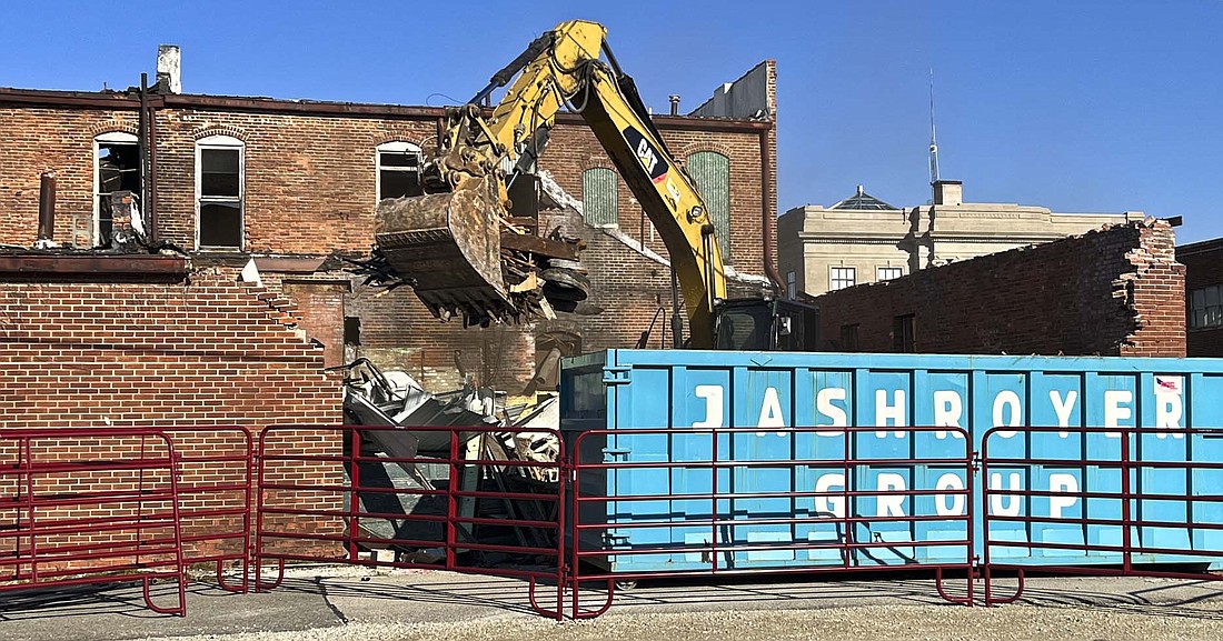 Demolition of a couple of local buildings began this week. Pictured above, JAShroyer Group of Muncie started the demolition of The Bailey Building at 201 through 205 W. Main St. in Portland. The City of Portland contracted with the firm to bring down the dilapidated structure. Shroyer Solutions of Muncie was also working on taking down the chimney and the west wing of the former Judge Haynes Elementary School. The Portland Foundation is in the process of repurposing the building to become Jay County Early Learning Center. (The Commercial Review/Ray Cooney)