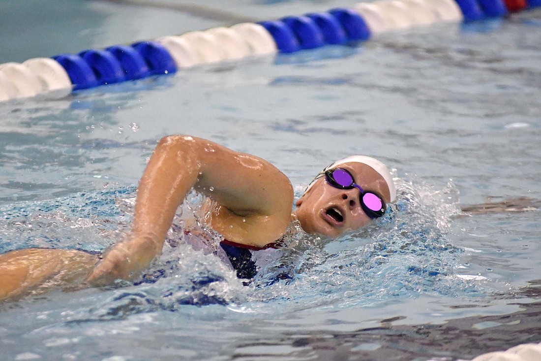 Avery Wentz swims in the 500-yard freestyle, which she won with a time of 6 minutes, 31.04 seconds, Tuesday during the Jay County High School girls swim team’s 198-44 win over Blufton. (The Commercial Review/Andrew Balko)