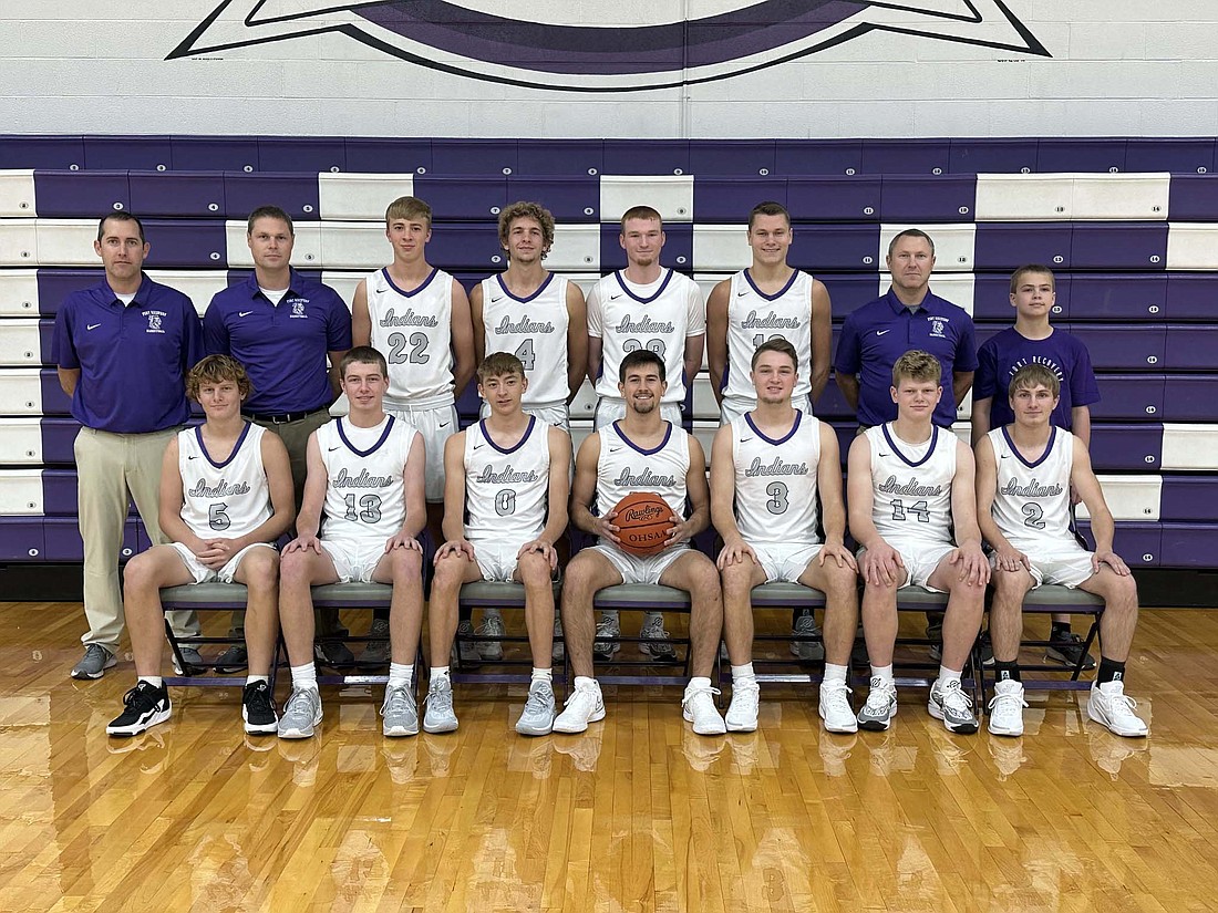 Pictured is the Fort Recovery High School boys basketball team. Front row from left are Colson Post, Mason Diller, Briggs Overman, Troy Homan, Reece Guggenbiller, Gavin Evers and Hayden Siefring. Back row are assistant coaches Scott Dilworth and Toby Metzger, Eli Lennartz, Alex Dues, Gavin Faller, Rex Leverette, coach Bob Leverette and manager Garrett Siefring. (Photo provided)