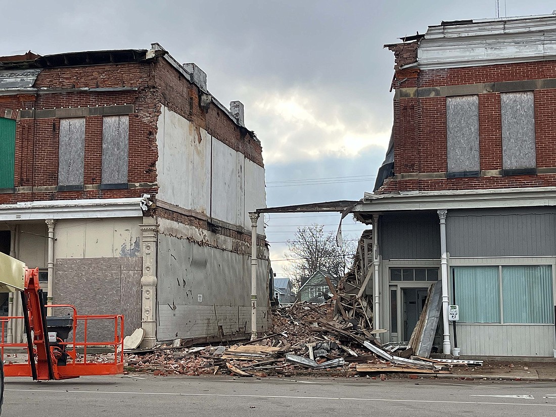 The JAShroyer Group crew working on the demolition of The Bailey Building on Main Street in Portland. The 205 W. Main St. portion of the building has been substantially removed. The city is demolishing the building that stretches from 201 through 205 W. Main St. and also reached an agreement with Chris Grieshop and Thomas Emerick to tear down 207 W. Main St., the former home of Schmit Chiropractic. Grieshop and Emerick are owners of The Greazy Pickle, which is adjacent to the buildings that are being demolished. (The Commercial Review/Ray Cooney)