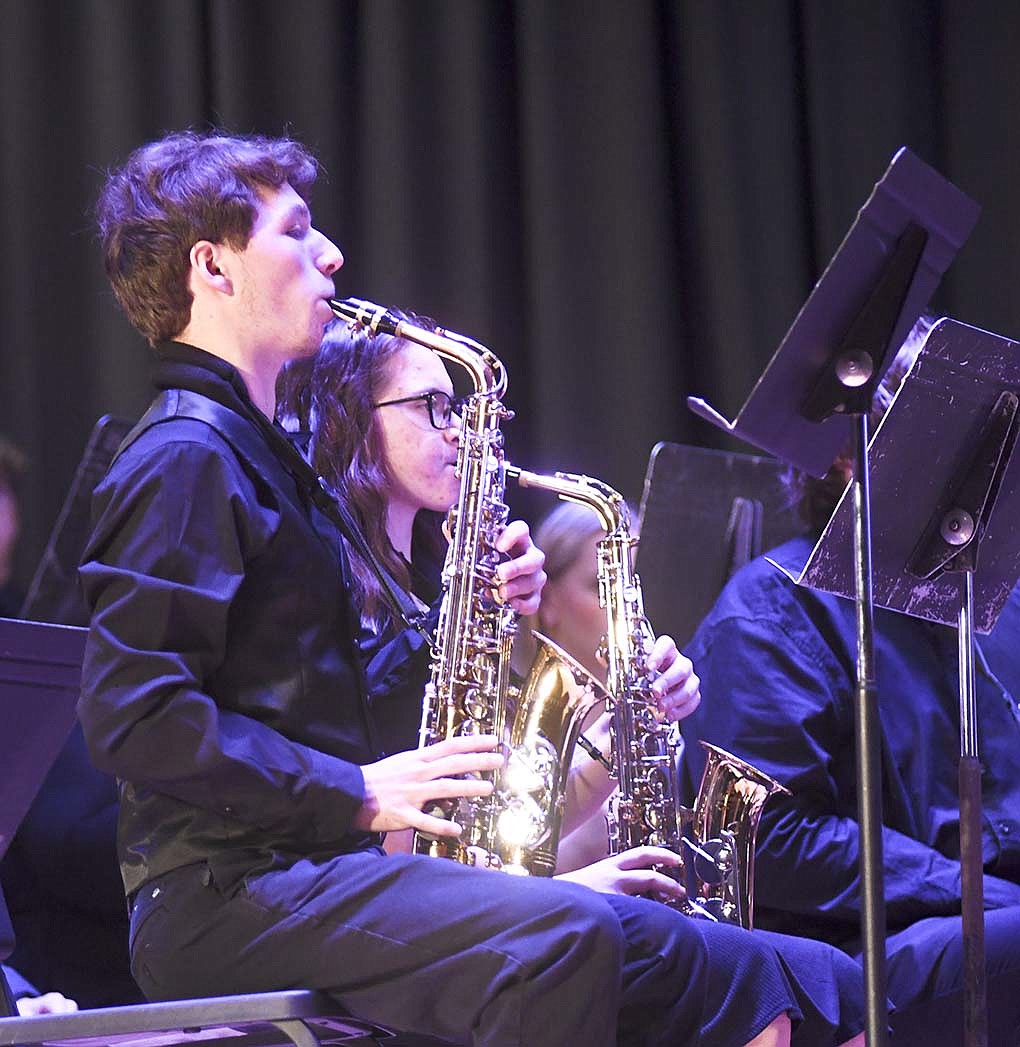 Lukes Powers plays the saxophone Sunday during the Jay County High School music department’s Christmas concert. The concert band’s selections included “Do You Hear What I Hear,” “Blue Christmas” and “A Christmas Carol.” (The Commercial Review/Ray Cooney)