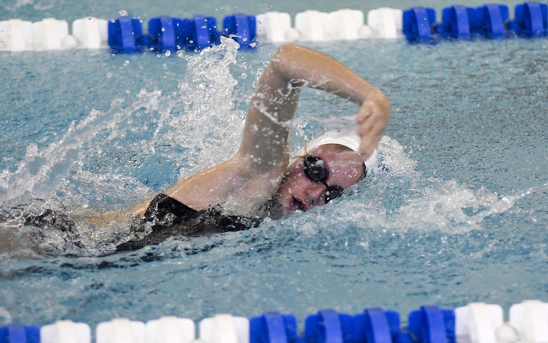 Kenzie Wendel of the Jay County Winter Swim Team competes in the freestyle Saturday during the Jay Winter Invite at the Jay County Junior-Senior High School pool. (The Commercial Review/Ray Cooney)