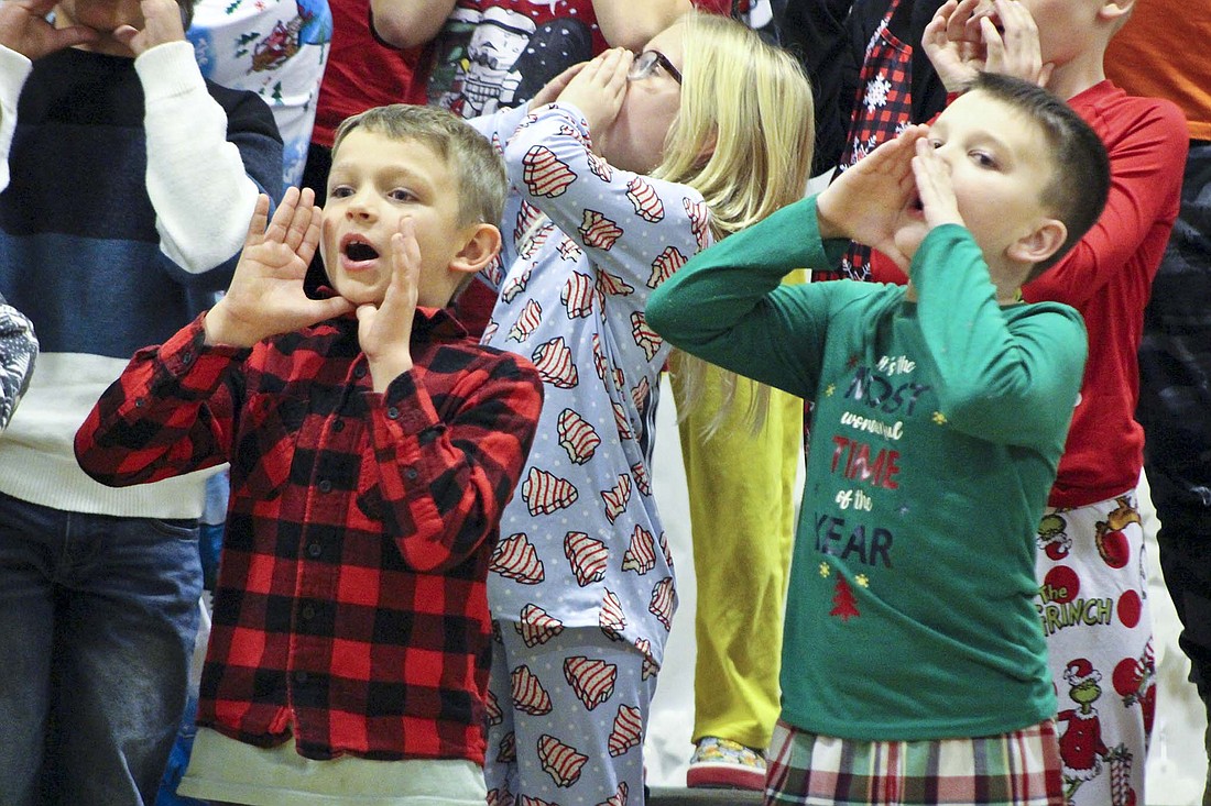 West Jay Elementary third graders sing “Rap It Up to Go” during their annual Christmas concert Thursday in the school’s gymnasium. (The Commercial Review/Bailey Cline)