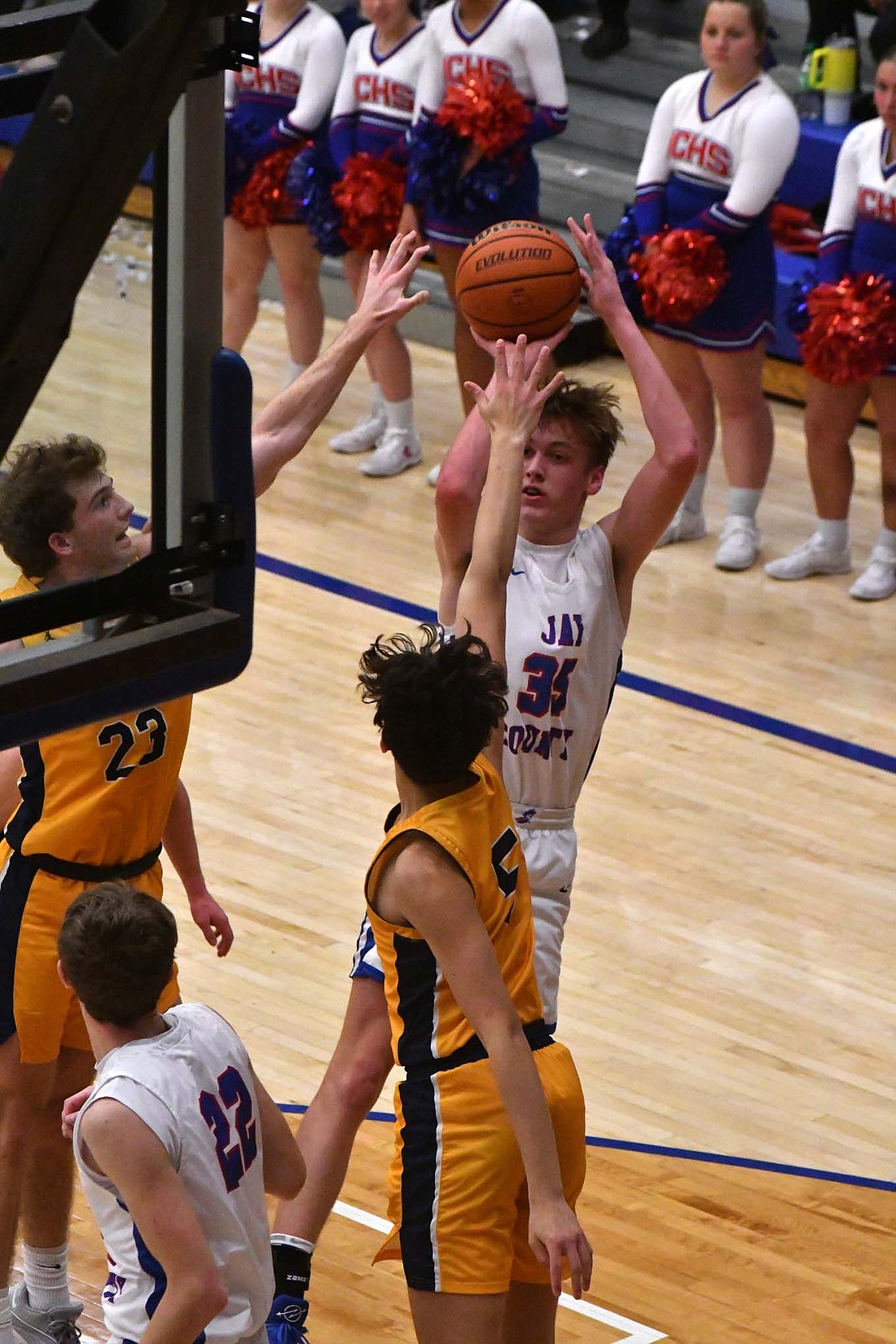 Jay County High School's Gradin Swoveland (35) fades away while shooting a jump shot near the end of the second quarter of the Patriots' 47-26 loss to the sixth-ranked Delta Eagles on Friday. Swoveland's shot was his only make of the game and snapped a 14-0 scoring drought. (The Commercial Review/Andrew Balko)