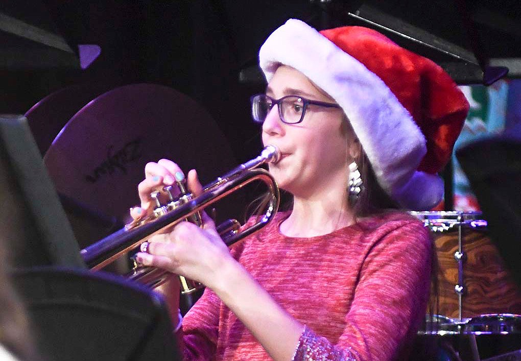 Brinley Fortkamp of the Fort Recovery junior high band plays the trumpet Sunday during the school’s Christmas concert. It included “Waltz of the Flowers” by Pyotr Ilyich Tchaikovsky and “A Special Christmas” arranged by David Shaffer. (The Commercial Review/Ray Cooney)