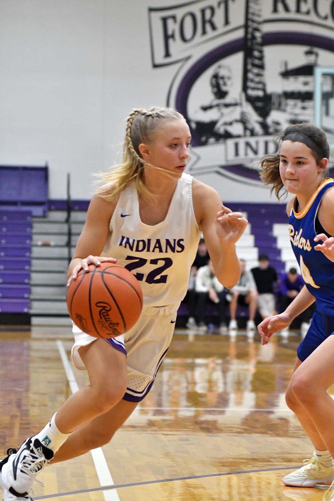 Fort Recovery High School freshman Makenna Huelskamp drives past Sophia Menker of St. Marys Memorial on Tuesday. Huelskamp had three points, two rebounds and one assist in the 34-31 loss. (The Commercial Review/Andrew Balko)