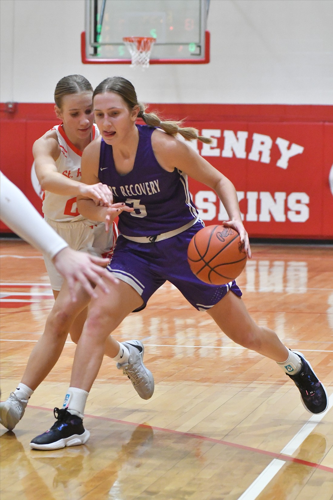 FRHS senior Karlie Neikamp drives in on St. Henry on Friday night in a 43-21 loss. Niekamp led the way for Fort Recovery with nine points. (The Commercial Review/Andrew Balko)