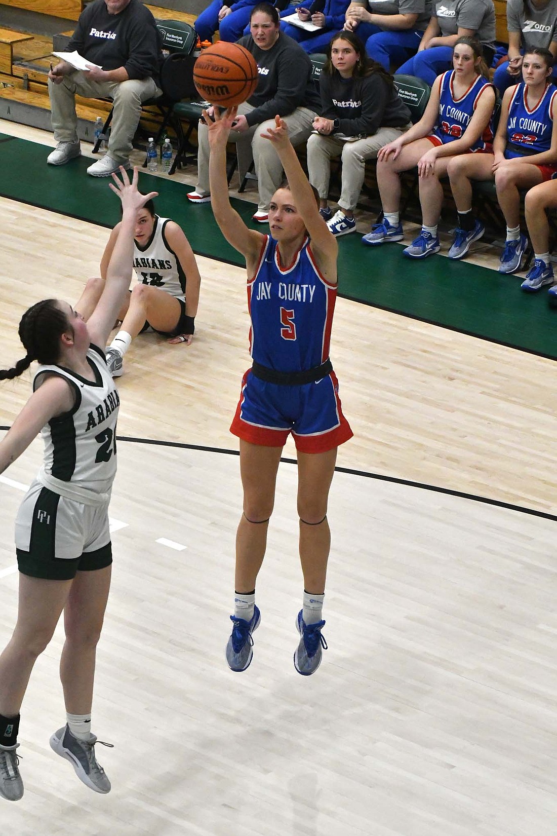 Molly Muhlenkamp hits one of her five made shots in Jay County High School’s 59-53 win over Pendleton Heights on Thursday. (The Commercial Review/Andrew Balko)