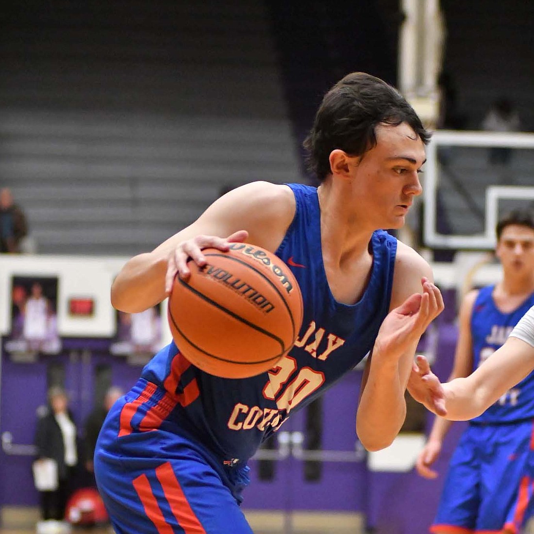 Jay County High SchoolÕs Aiden Phillips drives the baseline in the first quarter of the PatriotsÕ 55-36 loss at Muncie Central on Saturday night. On a night when Phillips didnÕt play in the junior varsity game, the sophomore tied Wesly Bihn for a team-high three rebounds as the Bearcats dominated Jay County on the boards 34-19. (The Commercial Review/Andrew Balko)