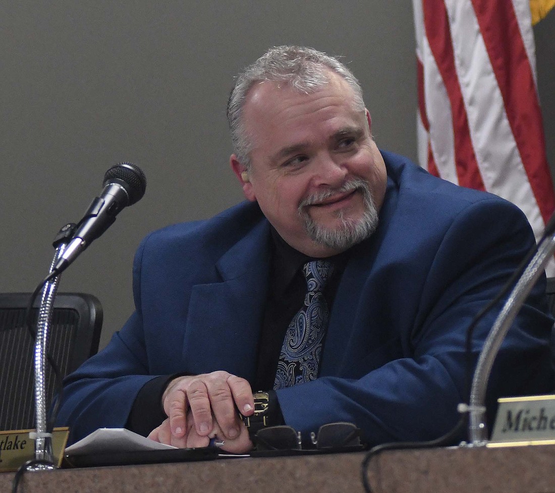 Portland Mayor Jeff Westlake smiles Tuesday while presiding over his first Portland City Council meeting. During the meeting, the new mayor announced that he had made changes in leadership of two city departments, naming Dustin Mock as the new police chief and Matt Shauver as the new superintendent of the street and parks department. They replace Steve Schlechty and Tom Leonhard, respectively. (The Commercial Review/Ray Cooney)