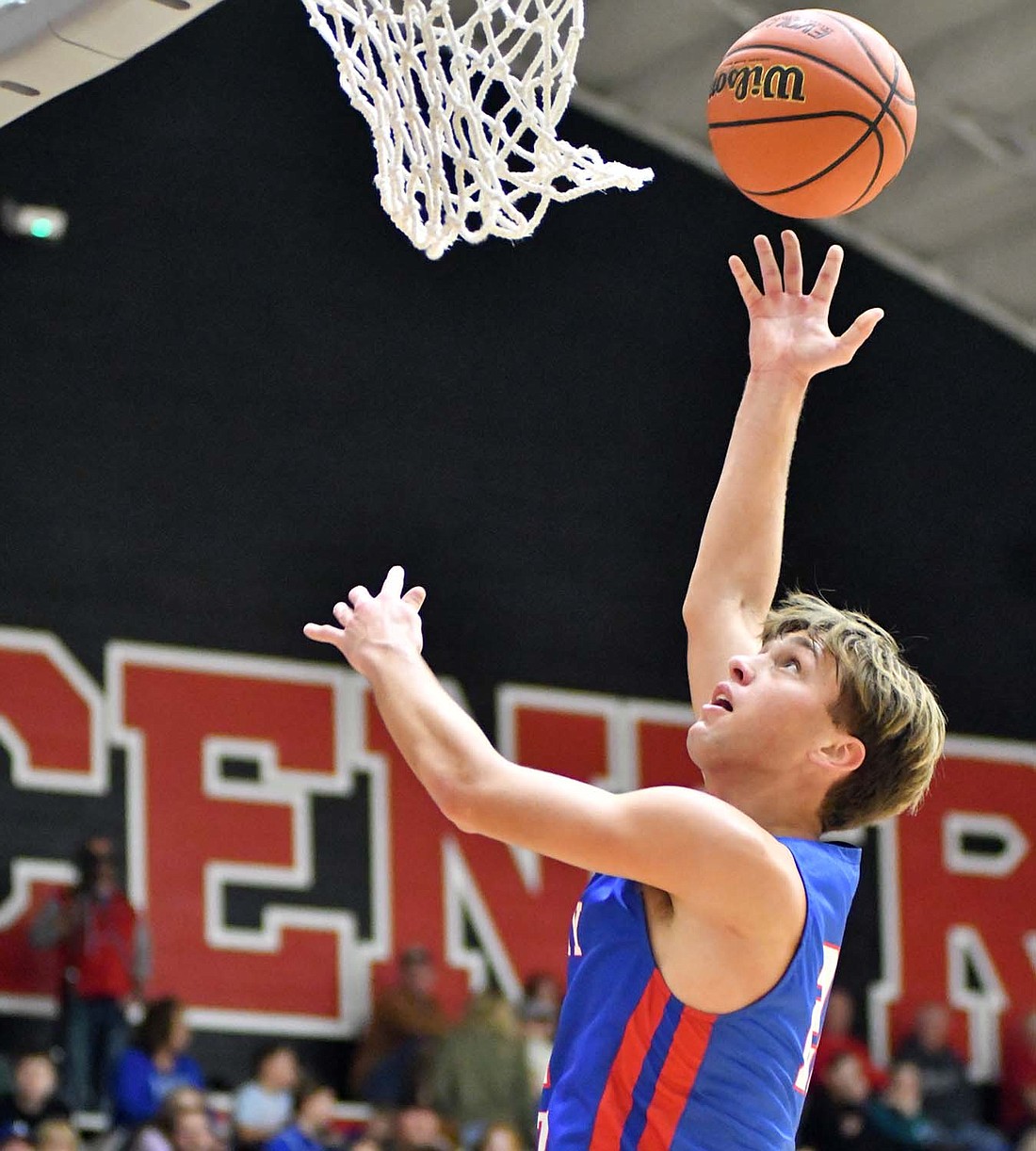 JCHS senior Trevin Dunnington puts up a baby hook late in a 66-48 blowout by host Adams Central. The Patriots struggled to defend Forward Isaac Schultz who dropped 32 points. (The Commercial Review/Andrew Balko)