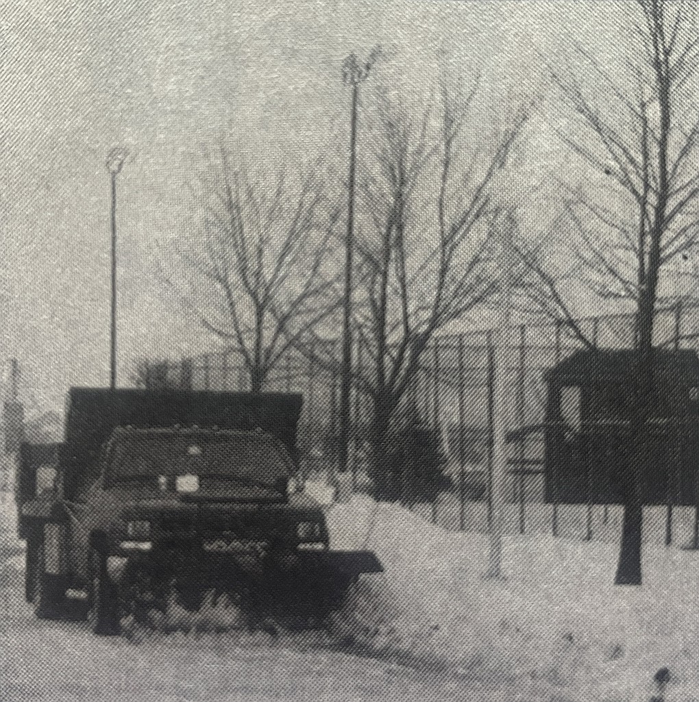 Jay School Corporation maintenance employee Larry Stultz clears the top layer of snow off sheets of ice on driveways at Jay County High School on Jan. 12, 1999. (The Commercial Review/Laurie Chen)